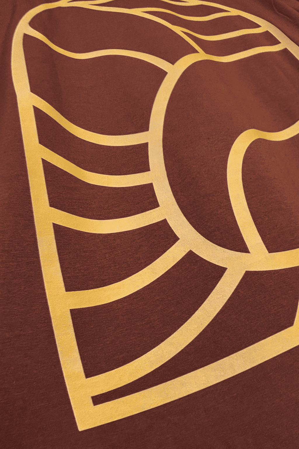 Brown fabric with gold geometric pattern