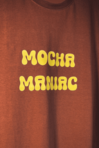 Brown t-shirt with yellow 'Mocha Maniac' text