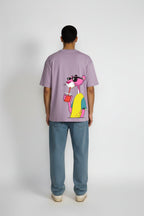 Close-up back view of Serial Chiller oversized lavender T-shirt featuring a cool pink character print