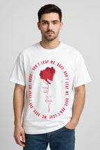 White oversized cotton tee with red rose and abstract face line art, "Don’t Leaf Me Rose", streetwear style